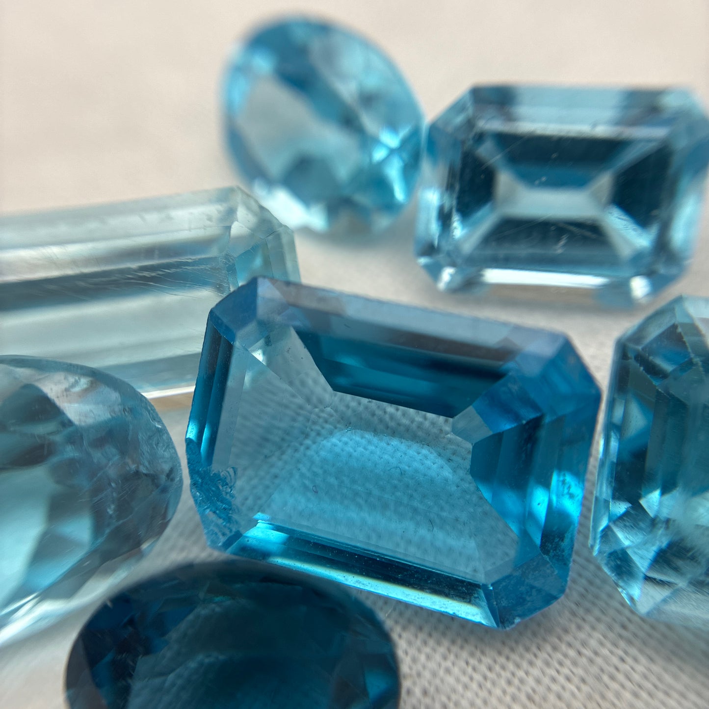 128 carat Lot of Damaged Blue Topaz-21 Piece Pre-formed Topaz Facet Rough