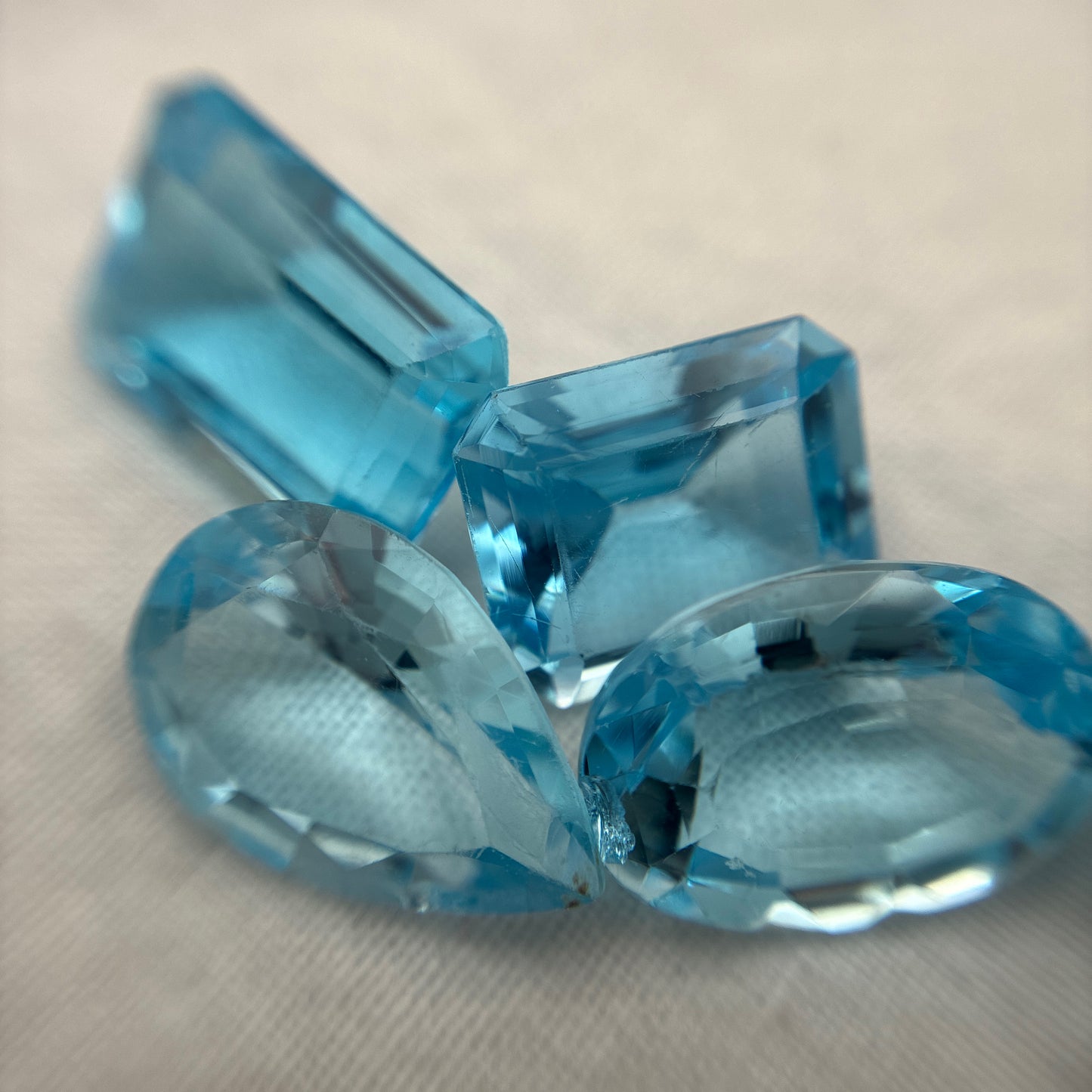 128 carat Lot of Damaged Blue Topaz-21 Piece Pre-formed Topaz Facet Rough