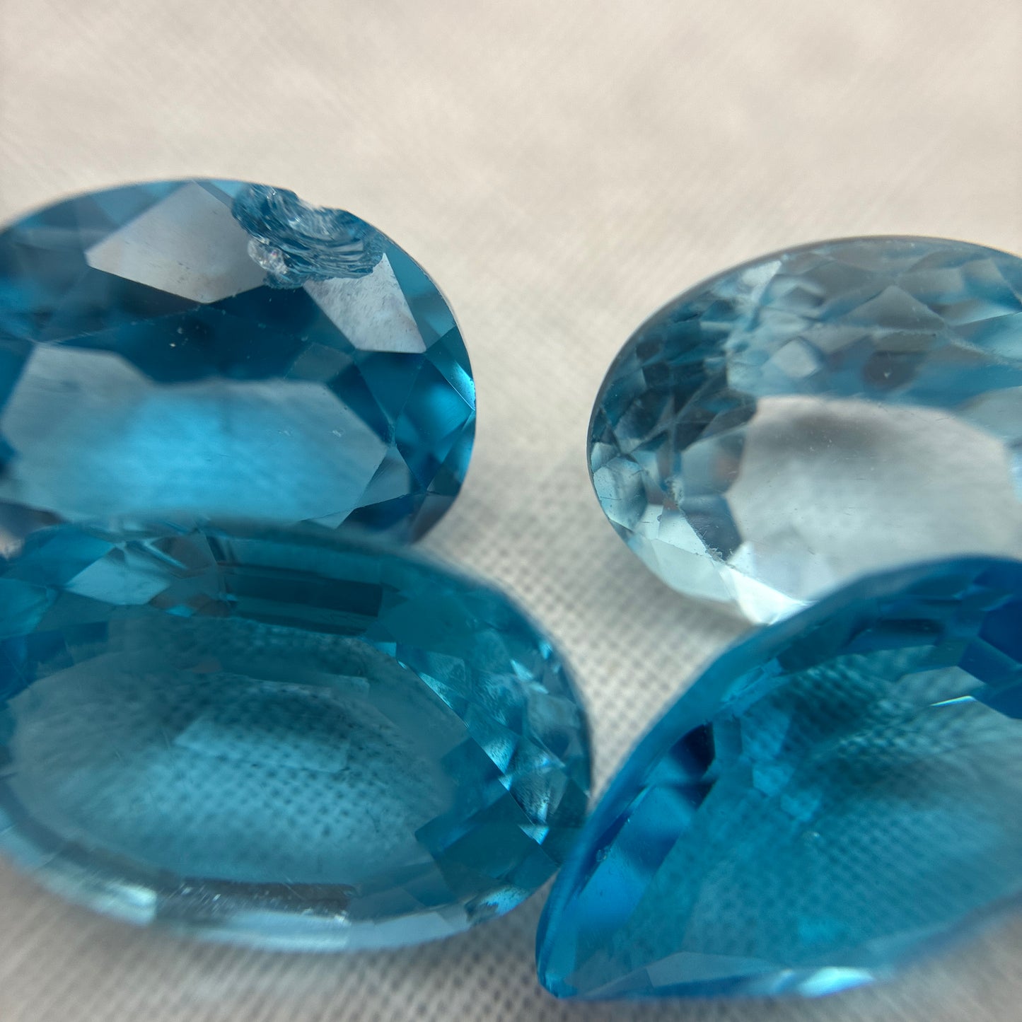 128 carat Lot of Damaged Blue Topaz-21 Piece Pre-formed Topaz Facet Rough