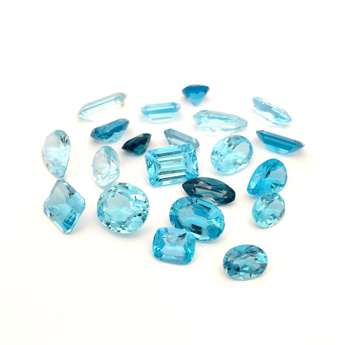 128 carat Lot of Damaged Blue Topaz-21 Piece Pre-formed Topaz Facet Rough
