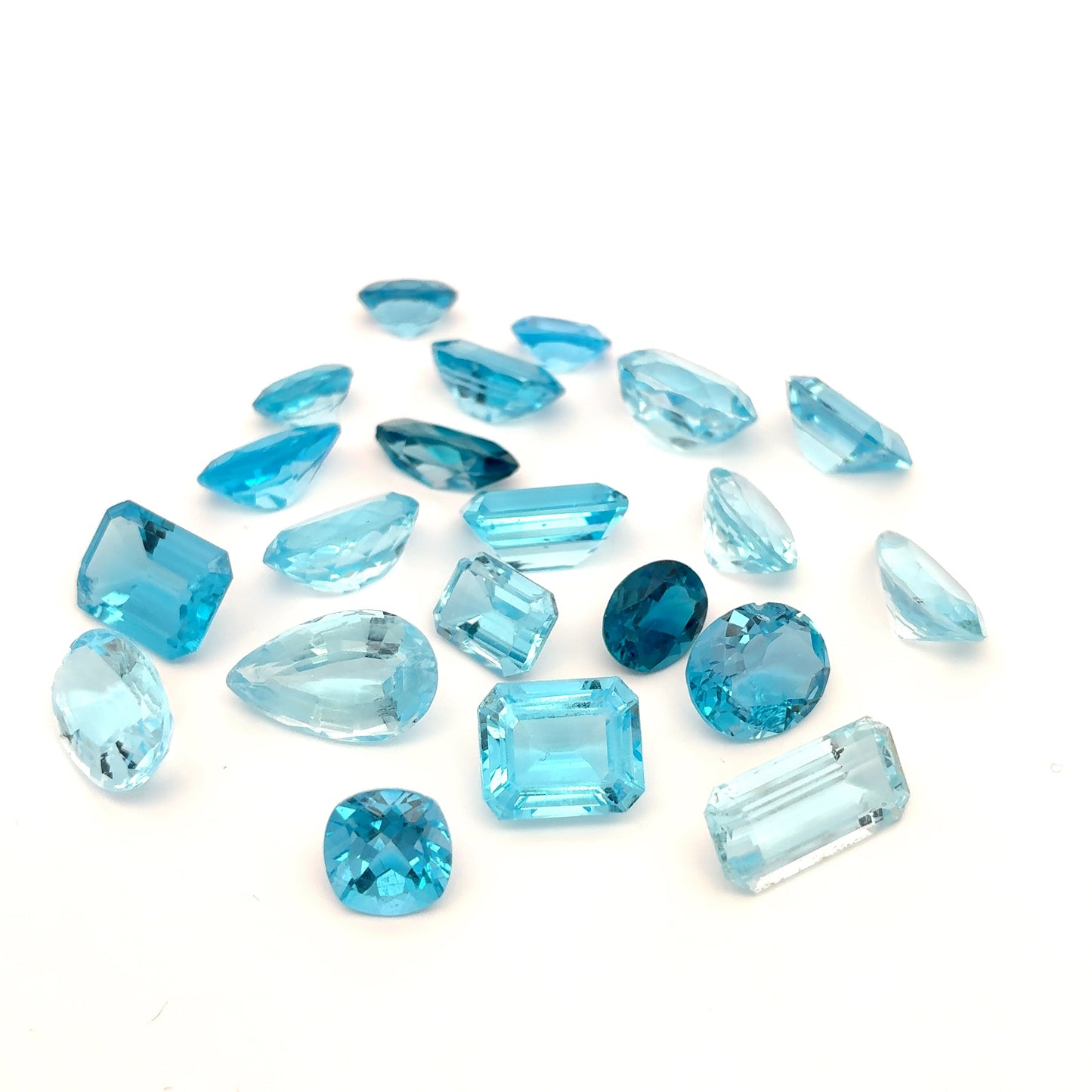 128 carat Lot of Damaged Blue Topaz-21 Piece Pre-formed Topaz Facet Rough