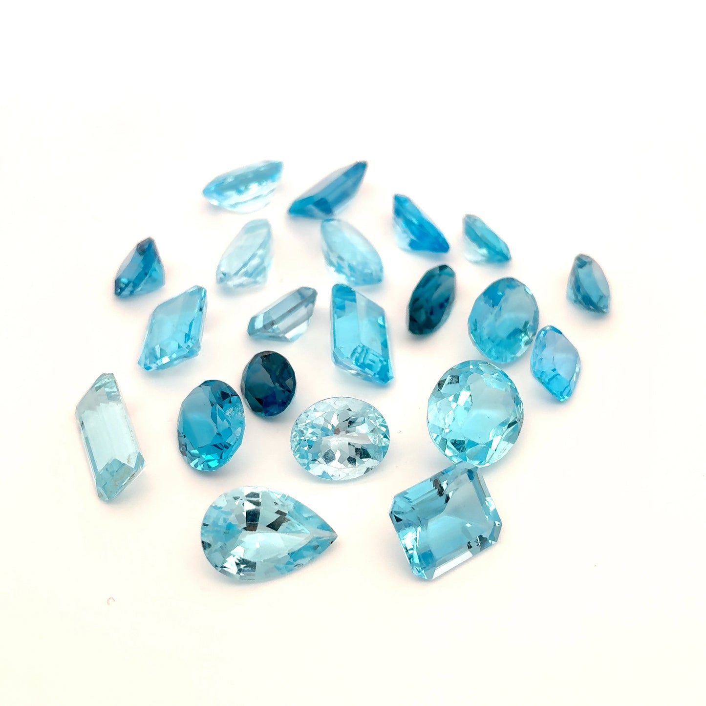 128 carat Lot of Damaged Blue Topaz-21 Piece Pre-formed Topaz Facet Rough