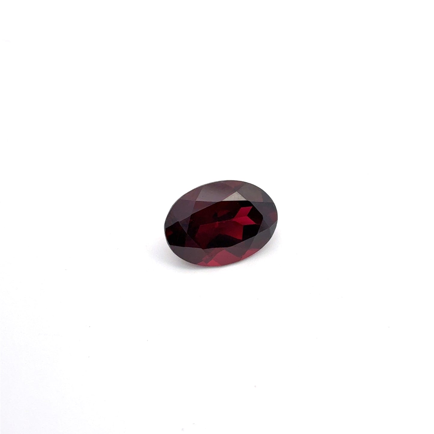 7.8 carat Purplish Red Garnet 14x10mm Oval Cut