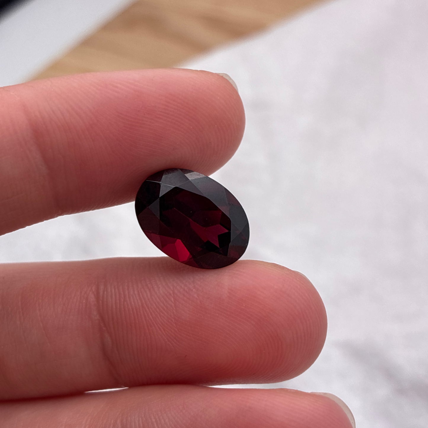7.8 carat Purplish Red Garnet 14x10mm Oval Cut
