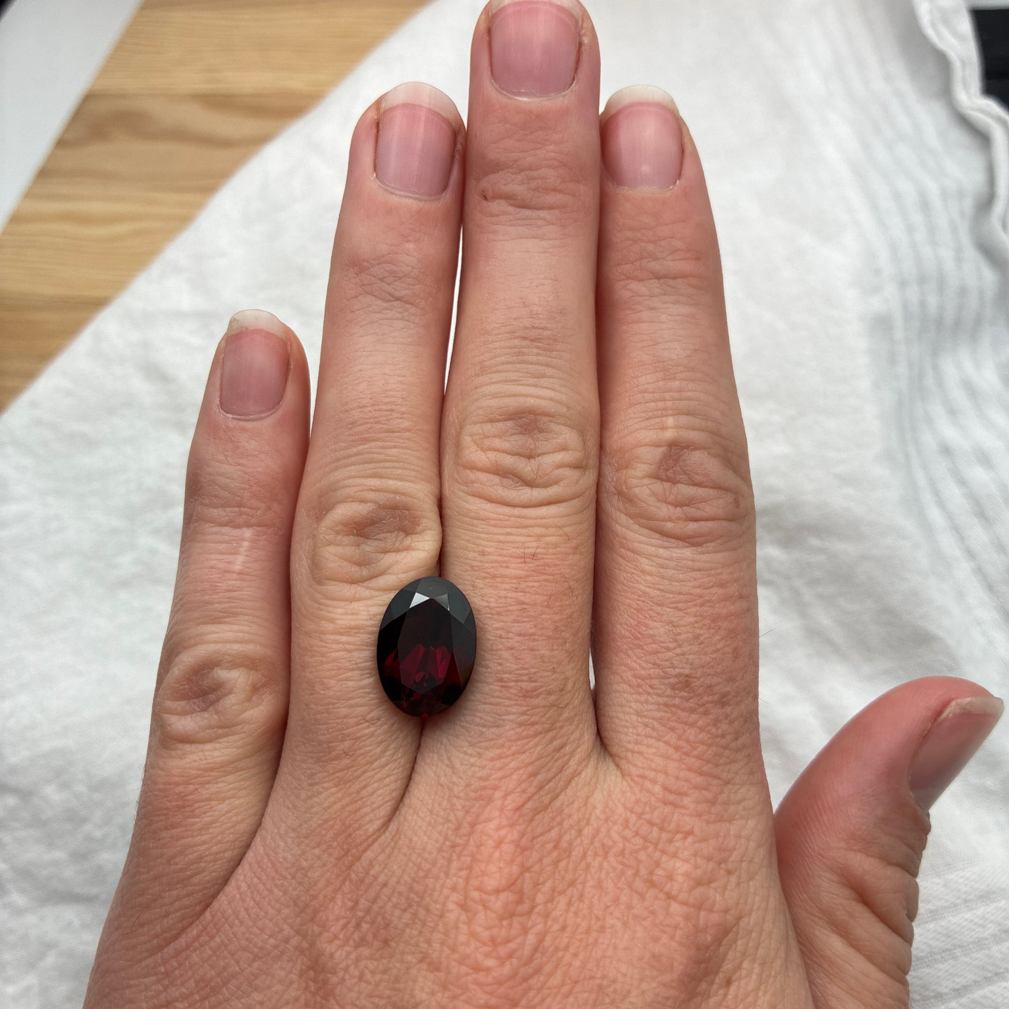 7.8 carat Purplish Red Garnet 14x10mm Oval Cut