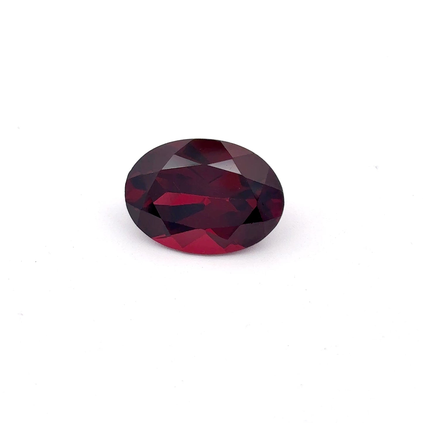 7.8 carat Purplish Red Garnet 14x10mm Oval Cut