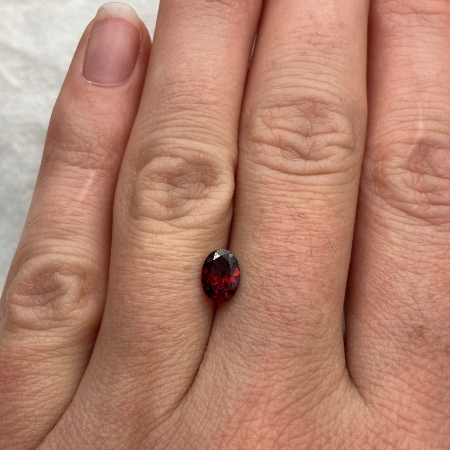 ONE 7x5mm Red Garnet Oval Cut