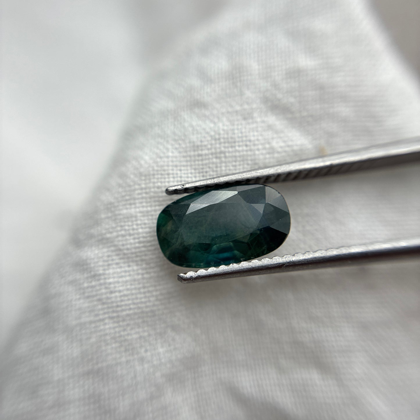 2.25 carat Teal Sapphire 10.2x6.1mm Oval Cut
