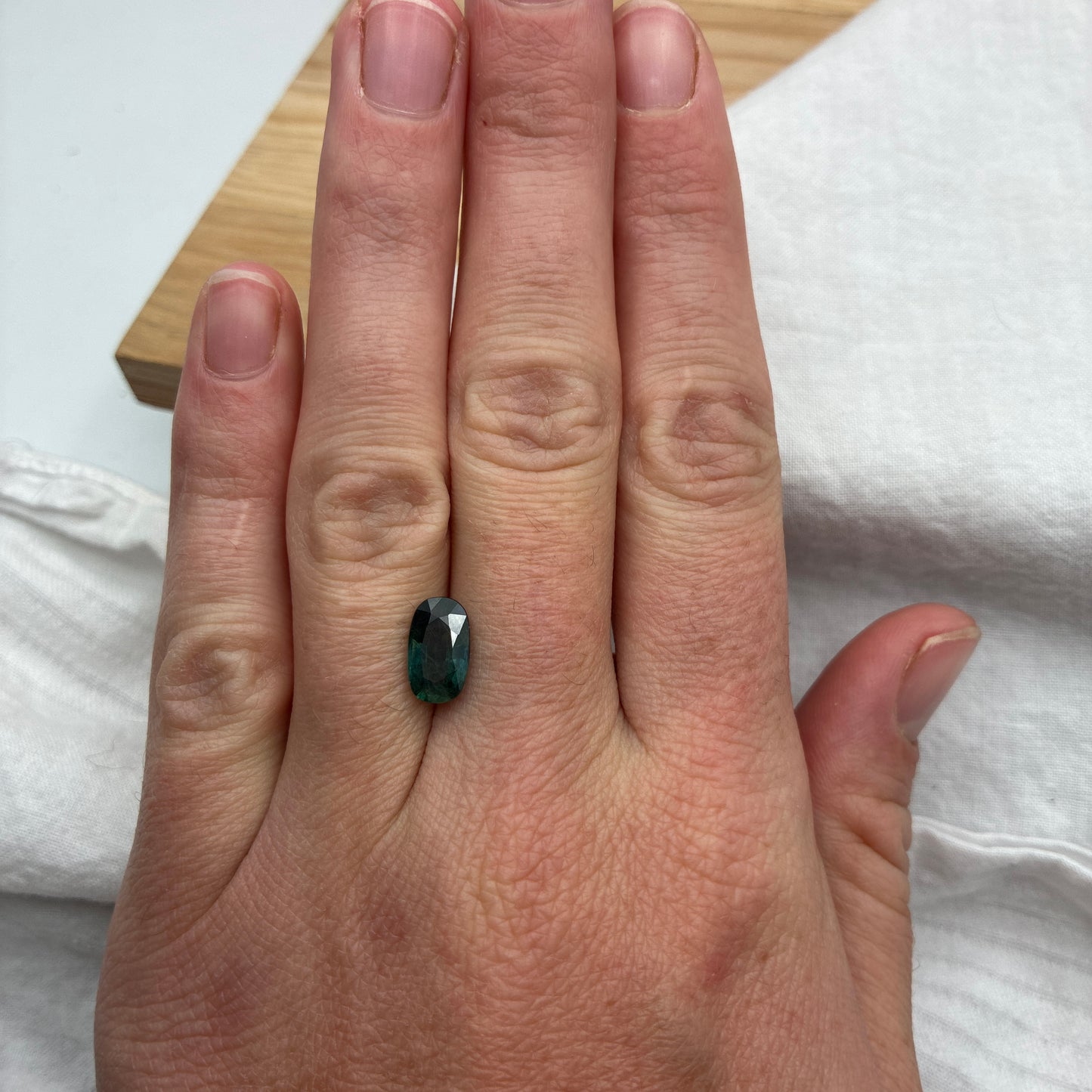 2.25 carat Teal Sapphire 10.2x6.1mm Oval Cut