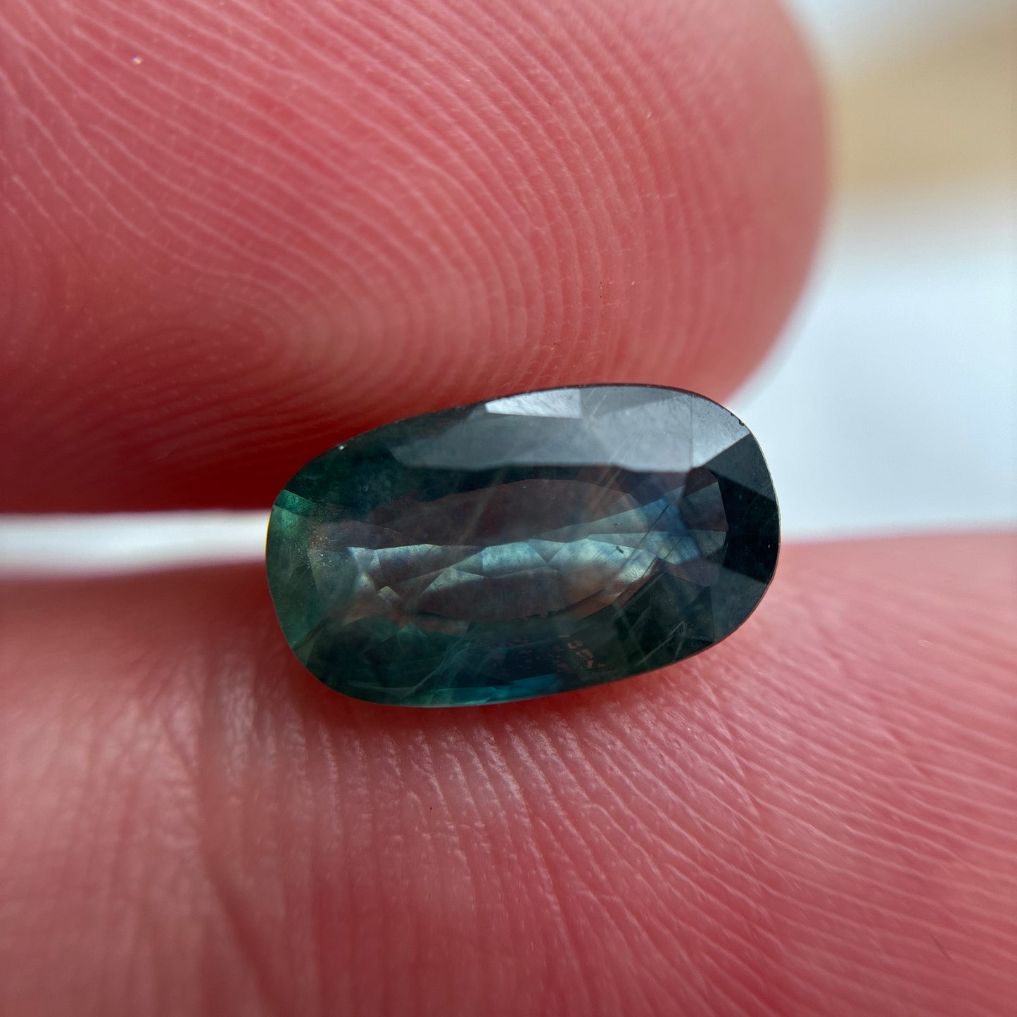 2.25 carat Teal Sapphire 10.2x6.1mm Oval Cut