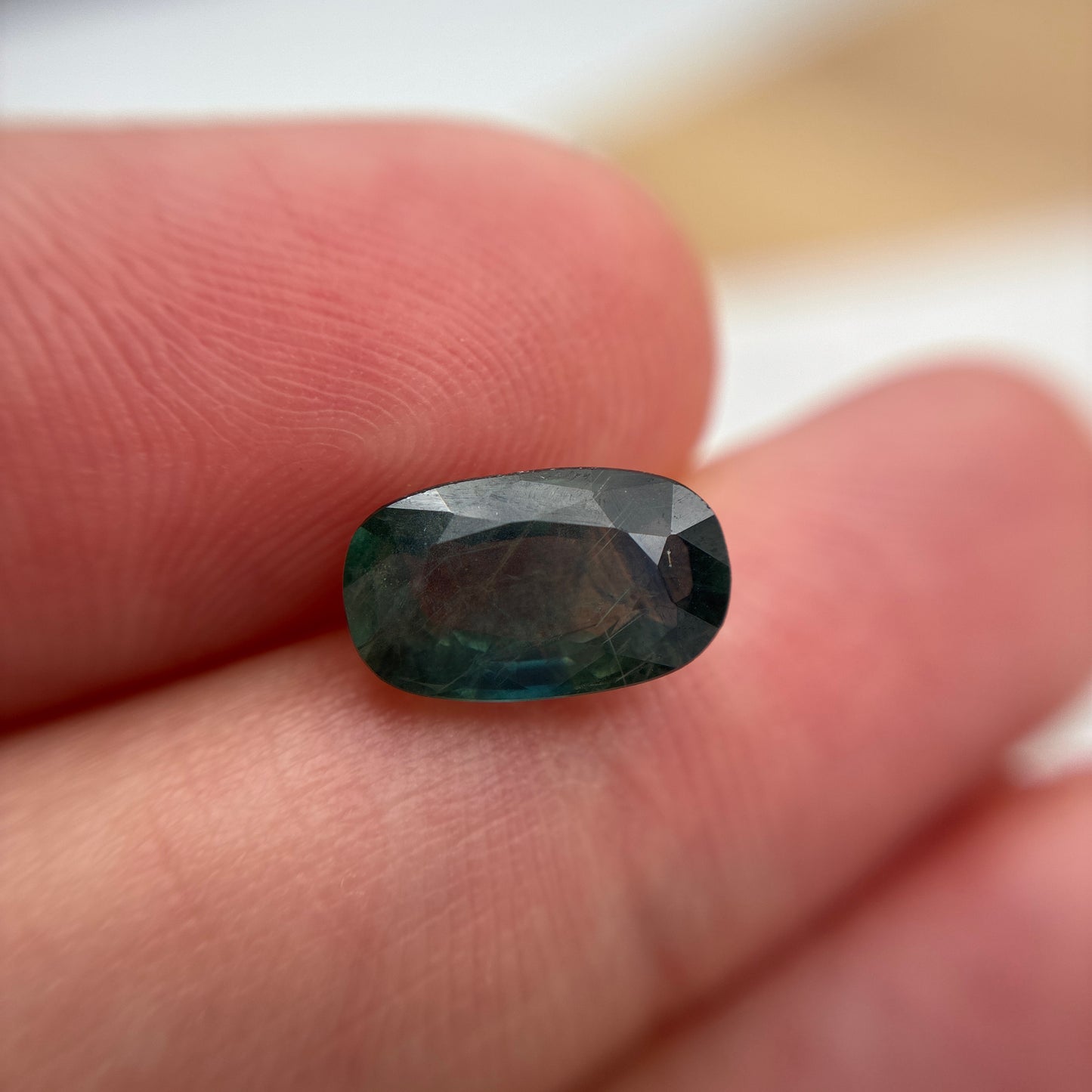 2.25 carat Teal Sapphire 10.2x6.1mm Oval Cut