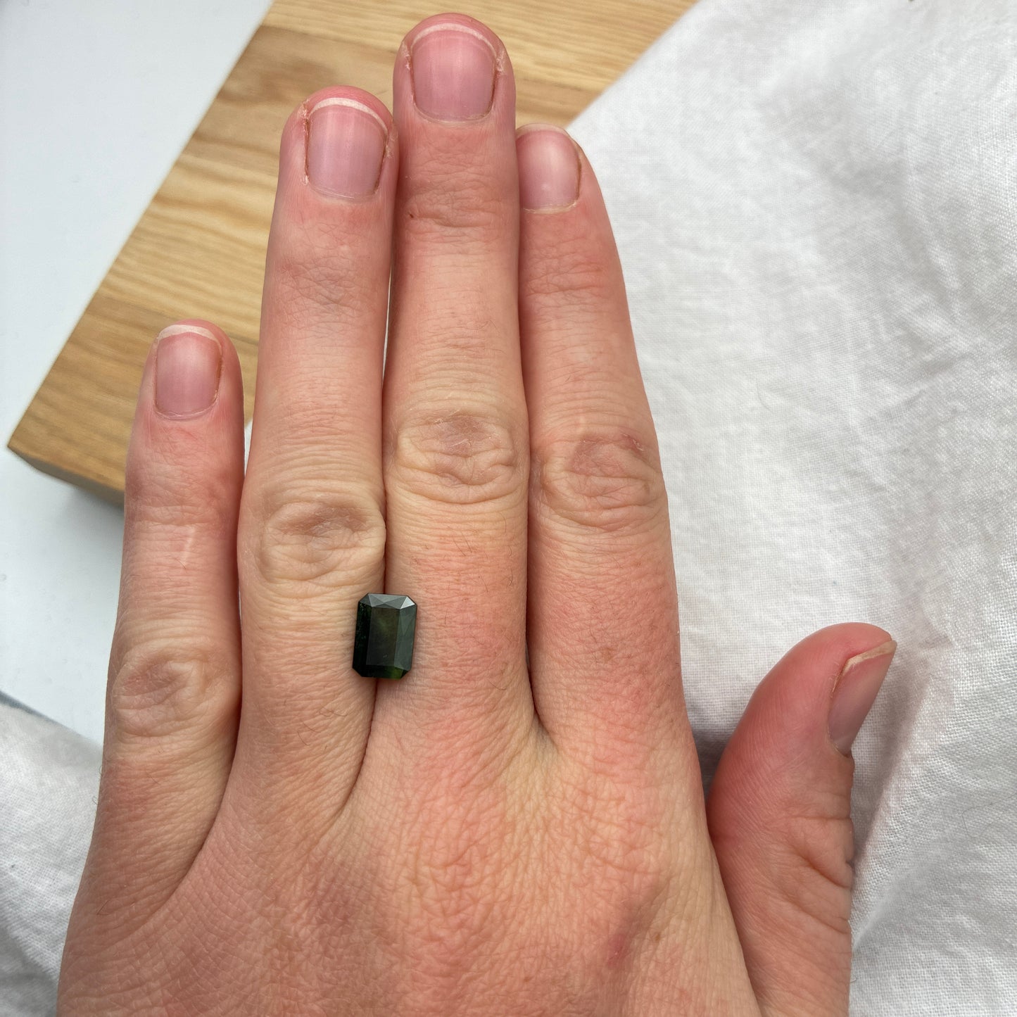 2 carat Sapphire 9.1x6.5mm Emerald Cut, BE Treated