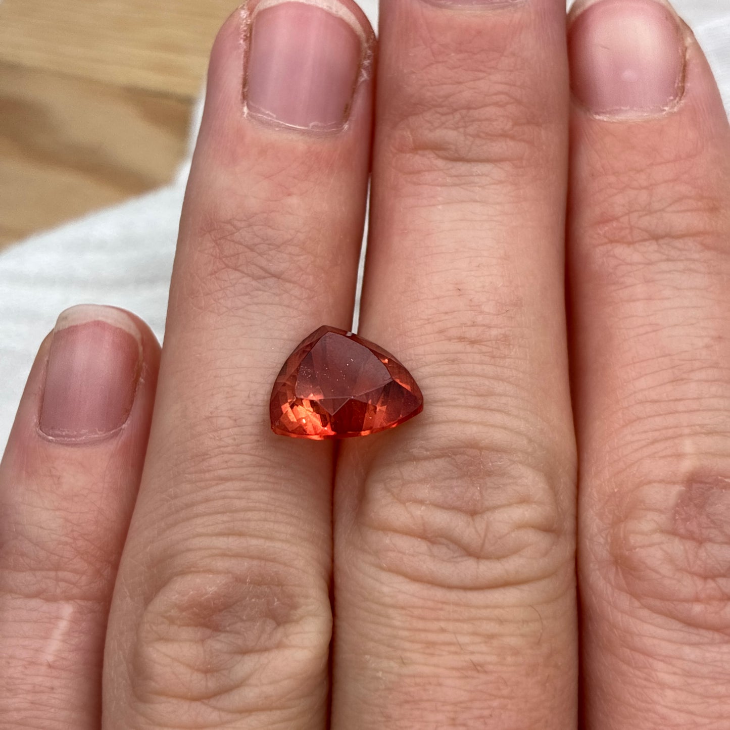 3.87 carat Orange Oregon Sunstone 10.75mm Trillion Cut