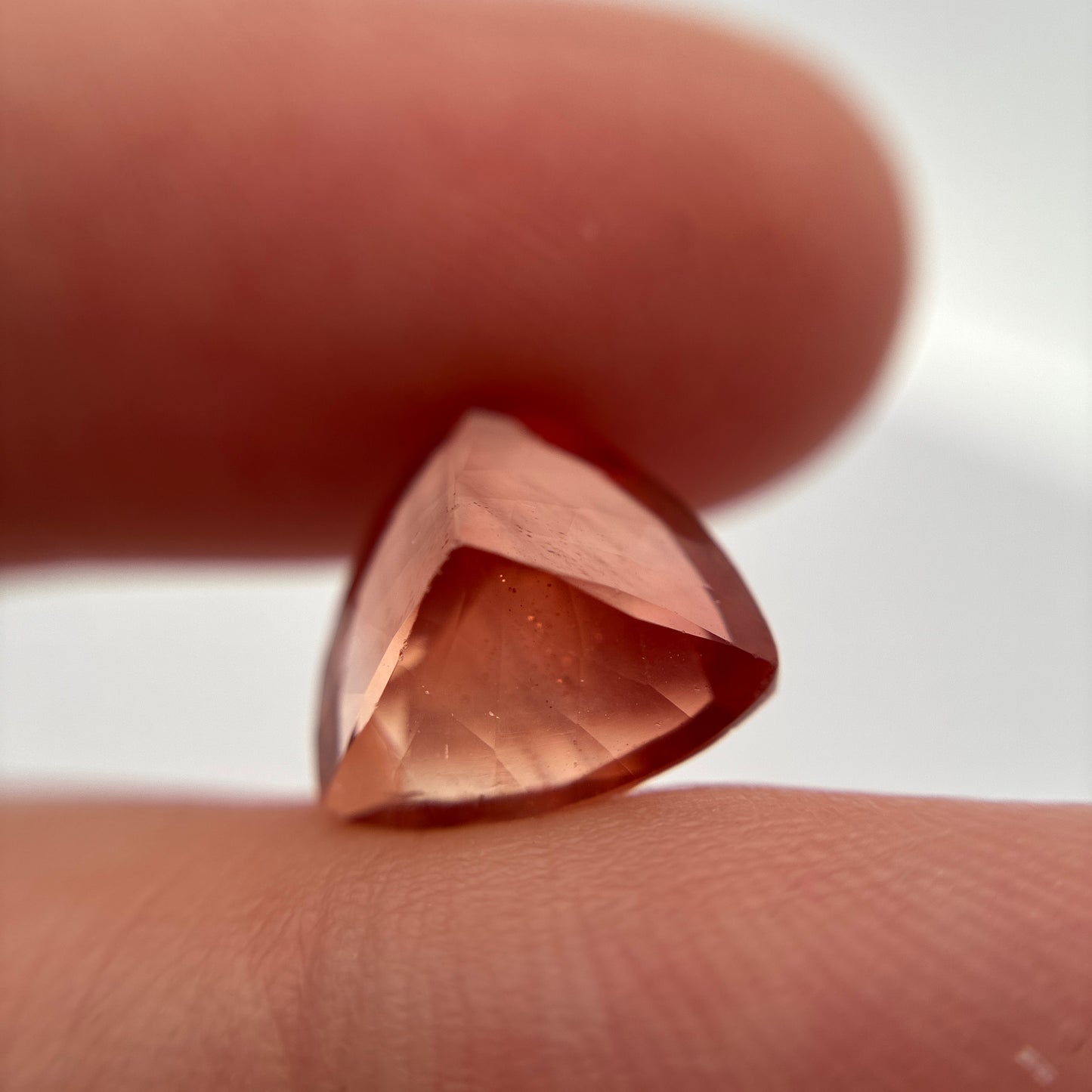 3.87 carat Orange Oregon Sunstone 10.75mm Trillion Cut