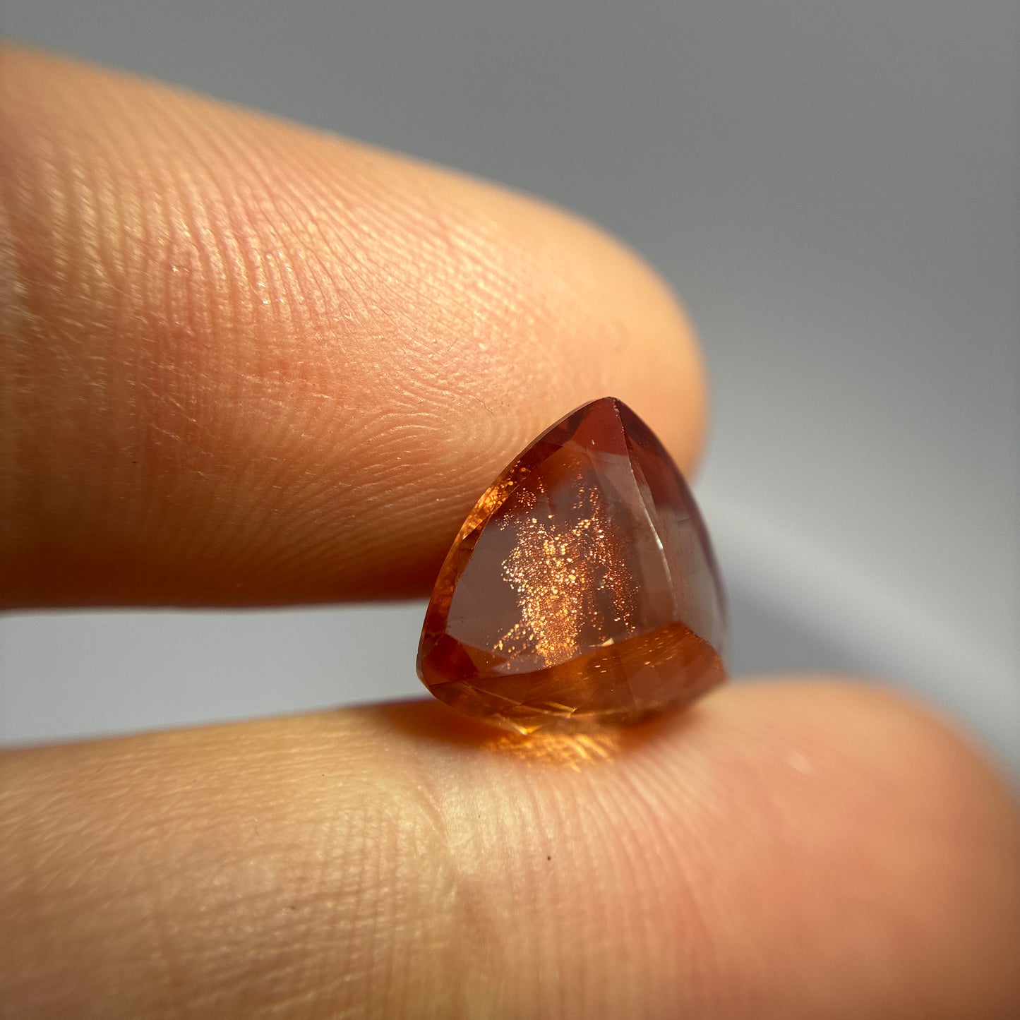 3.87 carat Orange Oregon Sunstone 10.75mm Trillion Cut