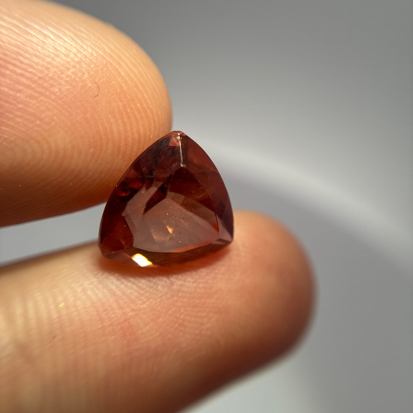 3.87 carat Orange Oregon Sunstone 10.75mm Trillion Cut