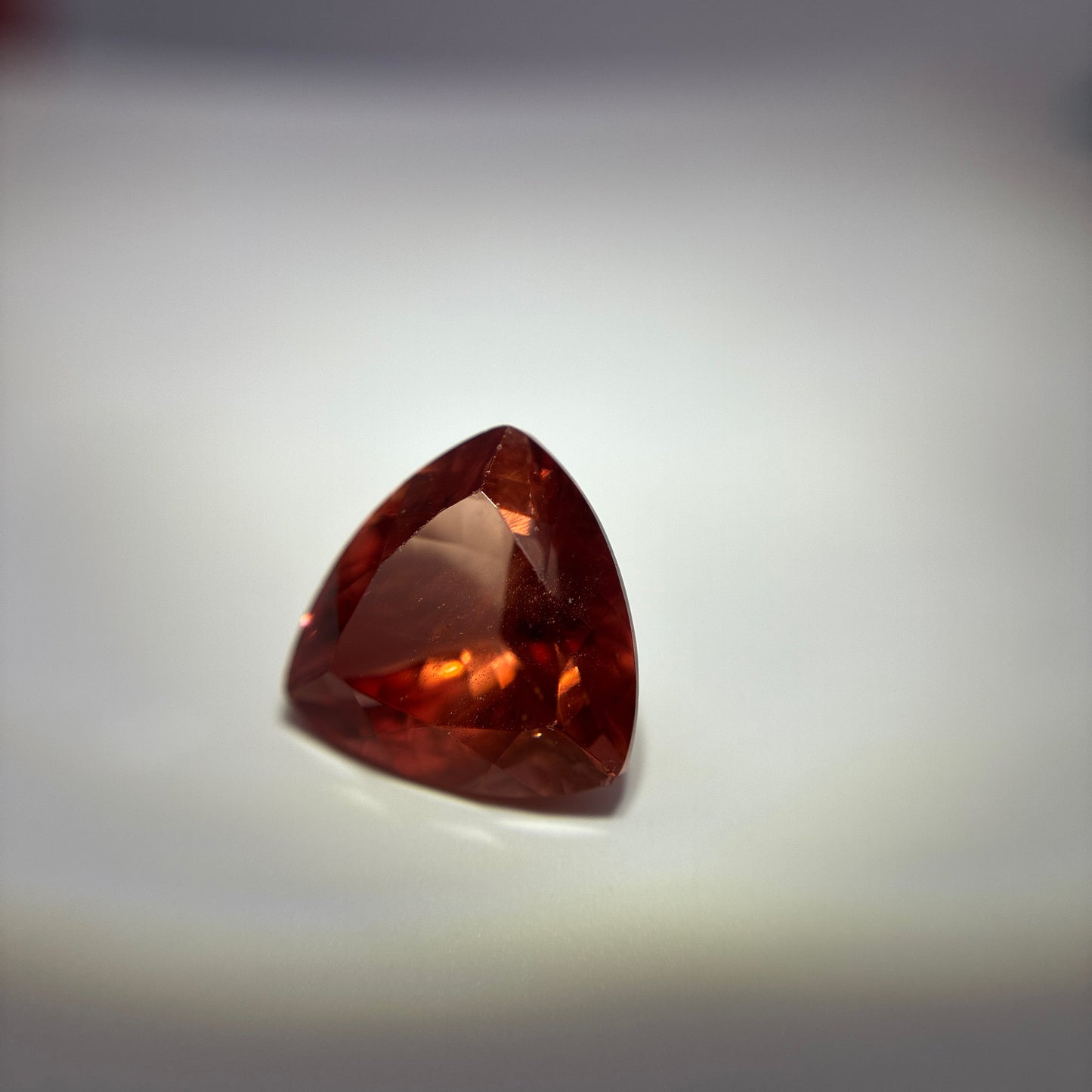 3.87 carat Orange Oregon Sunstone 10.75mm Trillion Cut