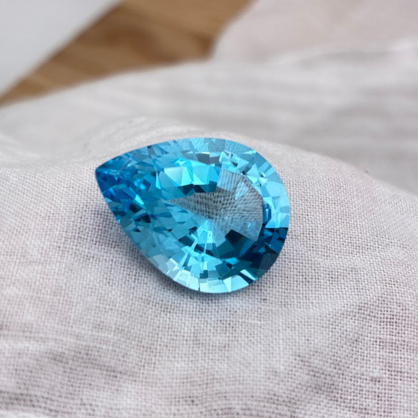 18 Carat Light Blue Topaz 19.75x15.0mm Pear Cut
