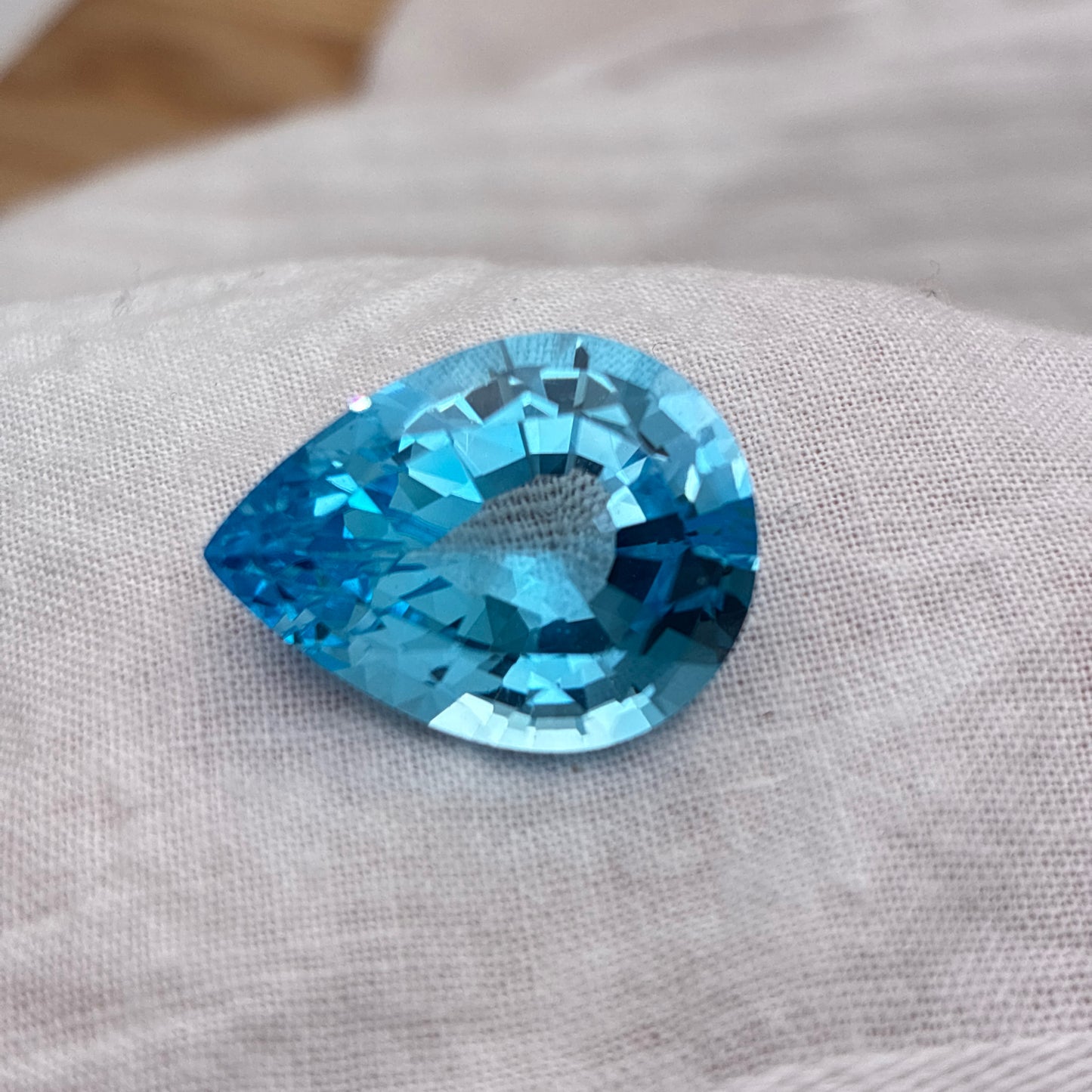 18 Carat Light Blue Topaz 19.75x15.0mm Pear Cut