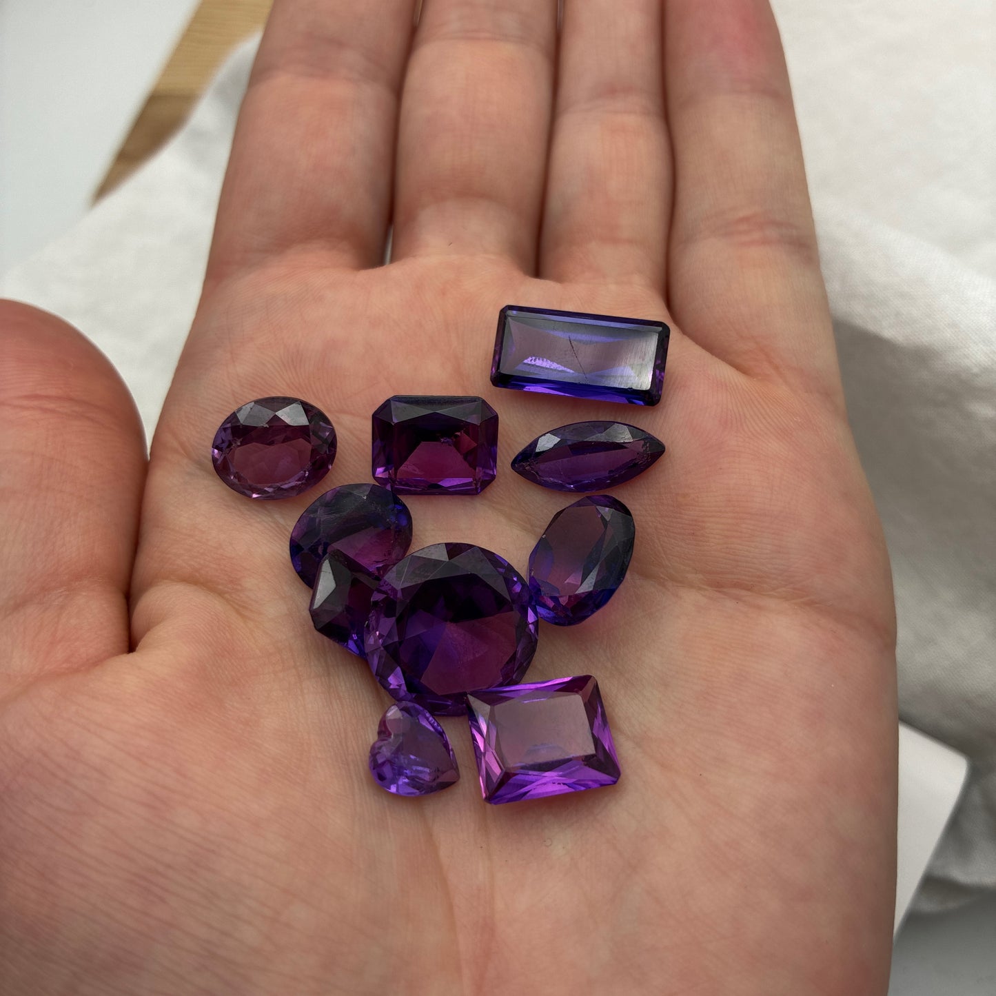 62.9 carat Lot of Lab Created Purple Sapphires , Worn, Faceted, Recycled, Chipped, Damaged Gemstones, 10 Stones