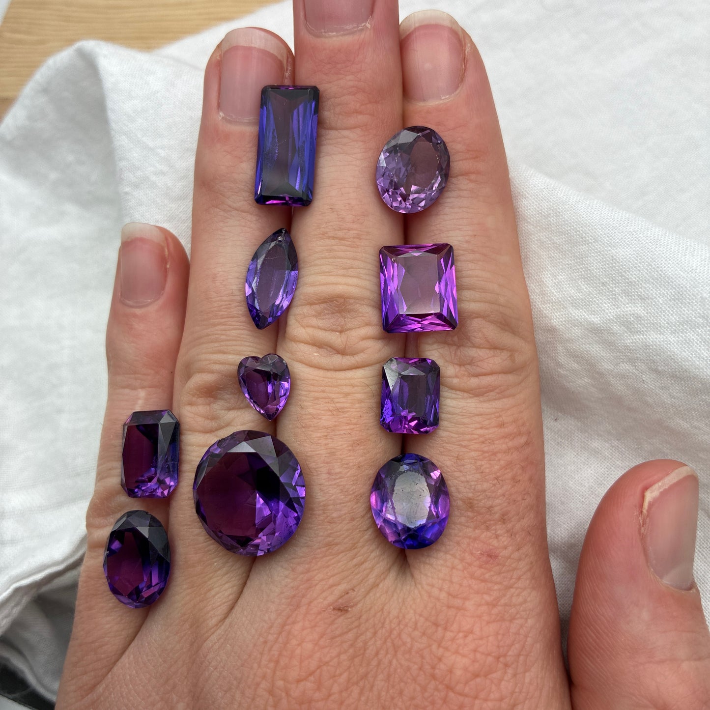 62.9 carat Lot of Lab Created Purple Sapphires , Worn, Faceted, Recycled, Chipped, Damaged Gemstones, 10 Stones