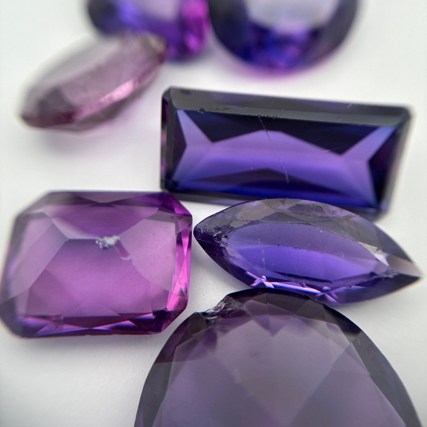 62.9 carat Lot of Lab Created Purple Sapphires , Worn, Faceted, Recycled, Chipped, Damaged Gemstones, 10 Stones
