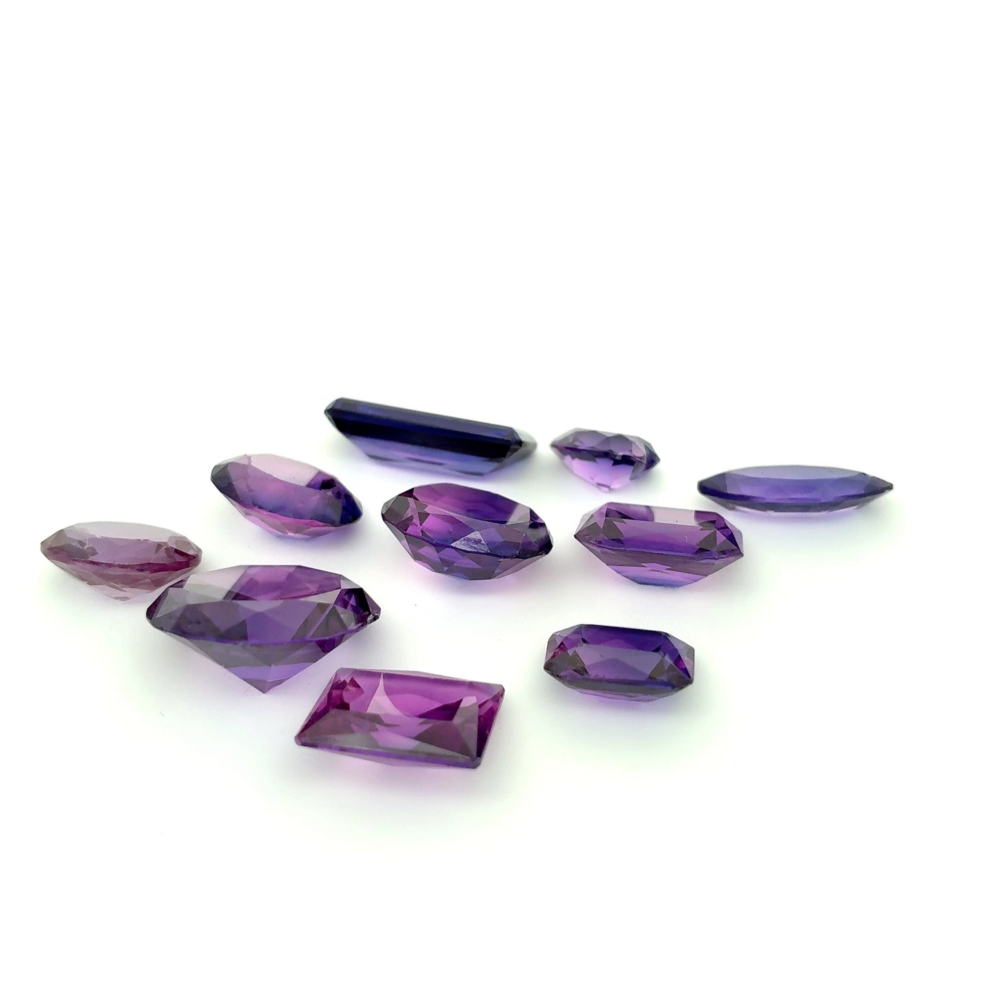 62.9 carat Lot of Lab Created Purple Sapphires , Worn, Faceted, Recycled, Chipped, Damaged Gemstones, 10 Stones