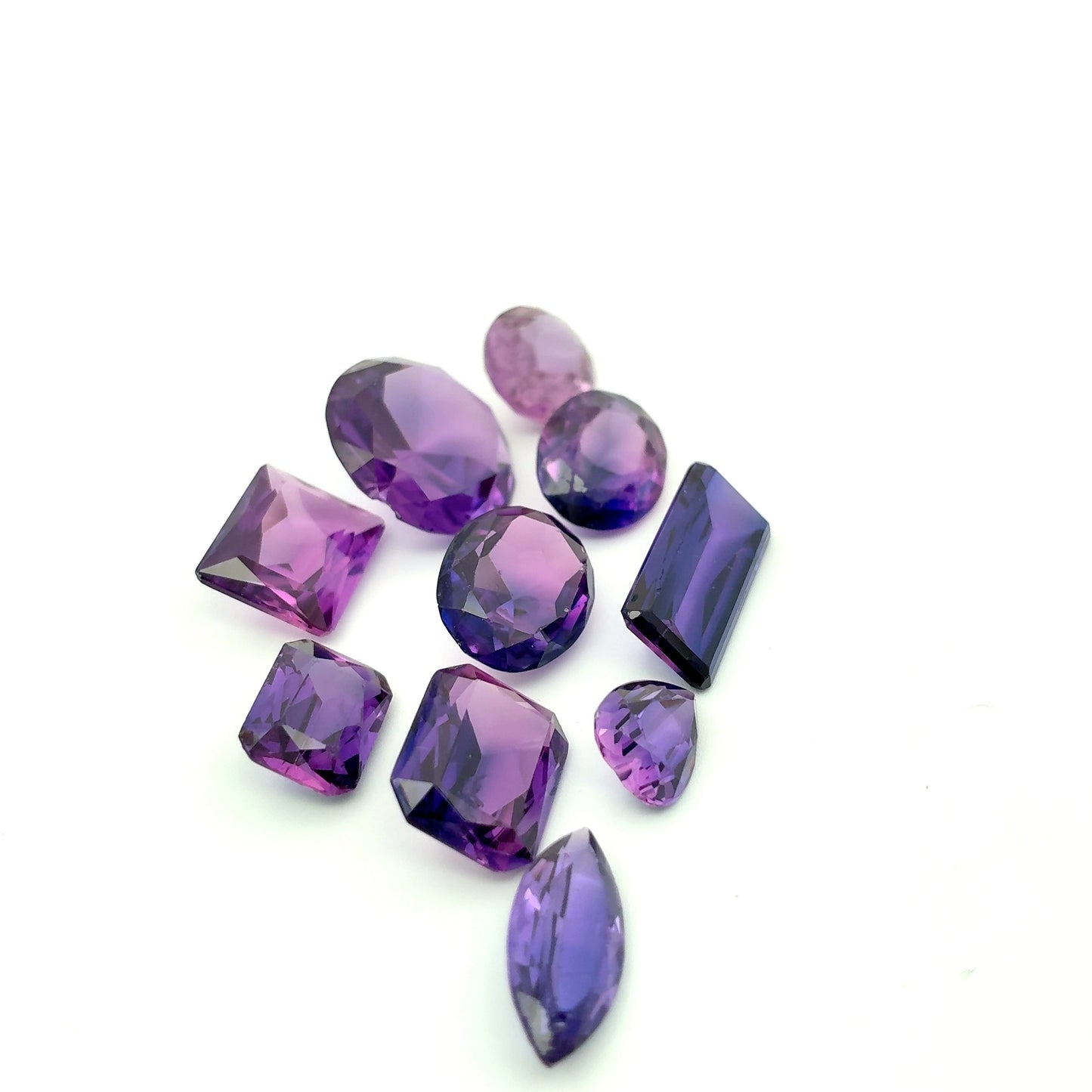 62.9 carat Lot of Lab Created Purple Sapphires , Worn, Faceted, Recycled, Chipped, Damaged Gemstones, 10 Stones