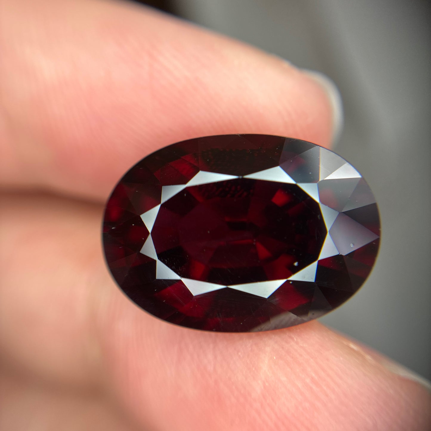 18.88 carat Red Garnet, 18.4x13.4mm Oval cut