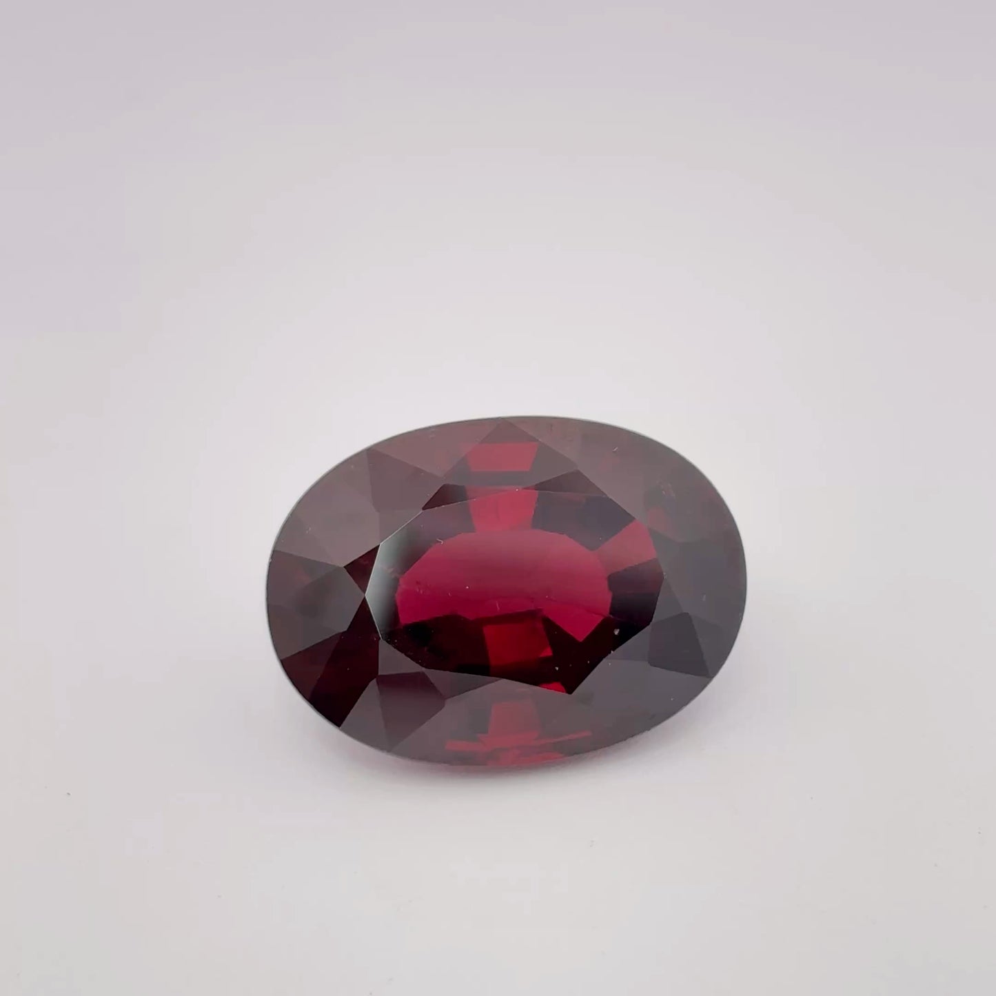 18.88 carat Red Garnet, 18.4x13.4mm Oval cut