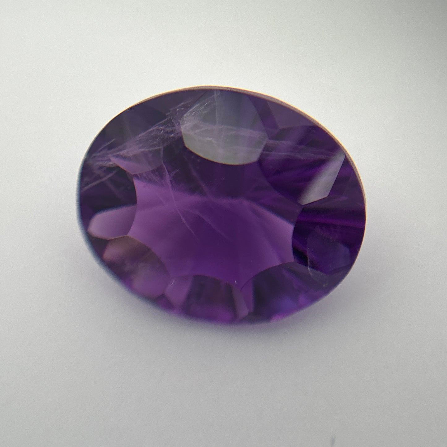 12x10mm Concave Oval Cut Amethyst, 3.94 carat