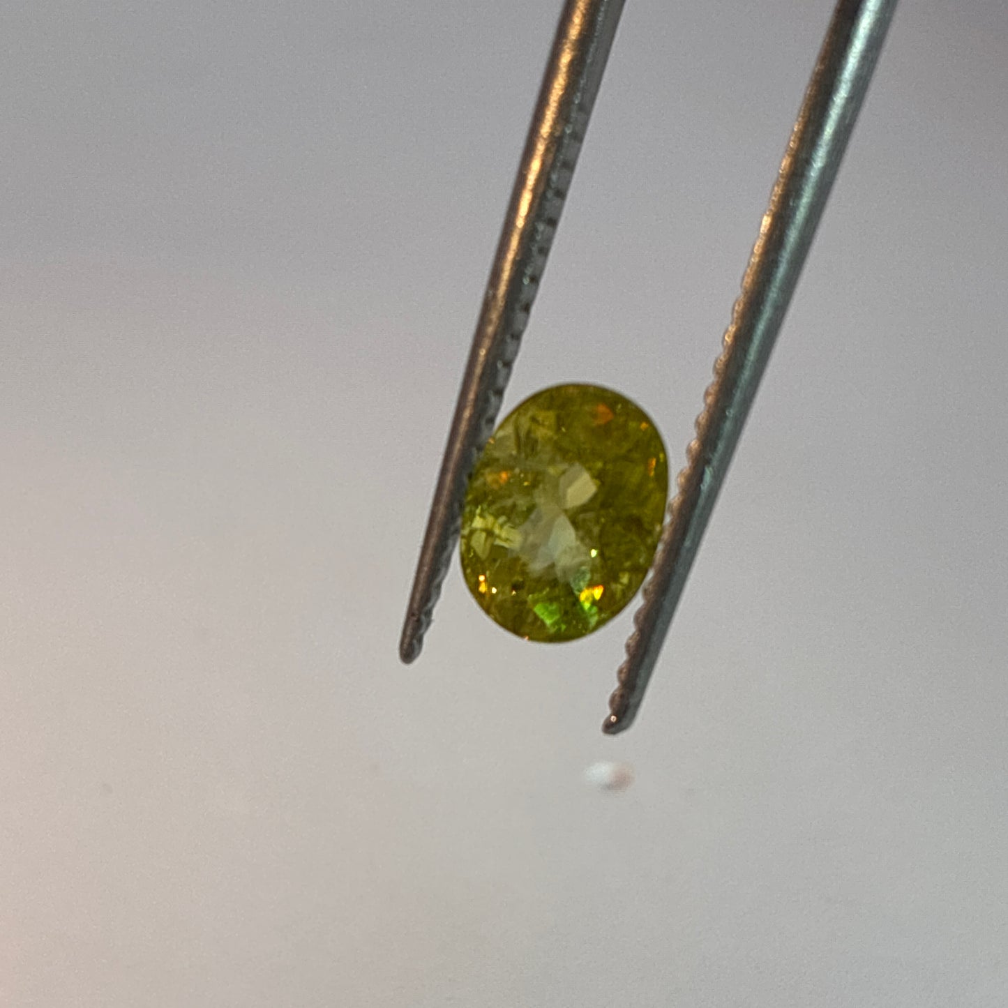 Oval Cut Yellowish-Green Sphene 1.35 carat