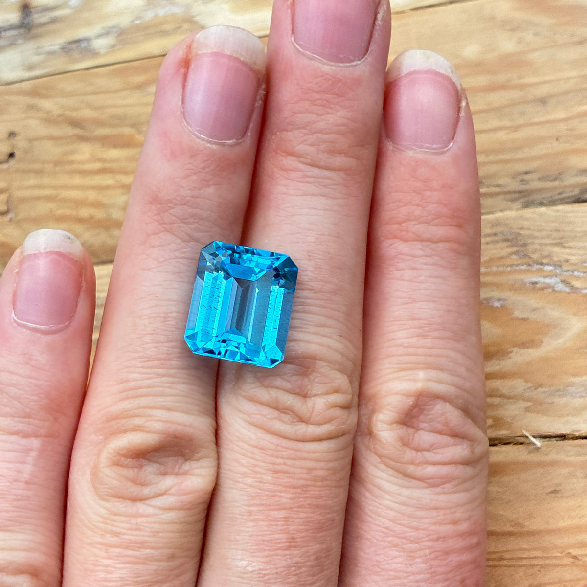 11.38 carat Emerald Cut Loose Blue Topaz