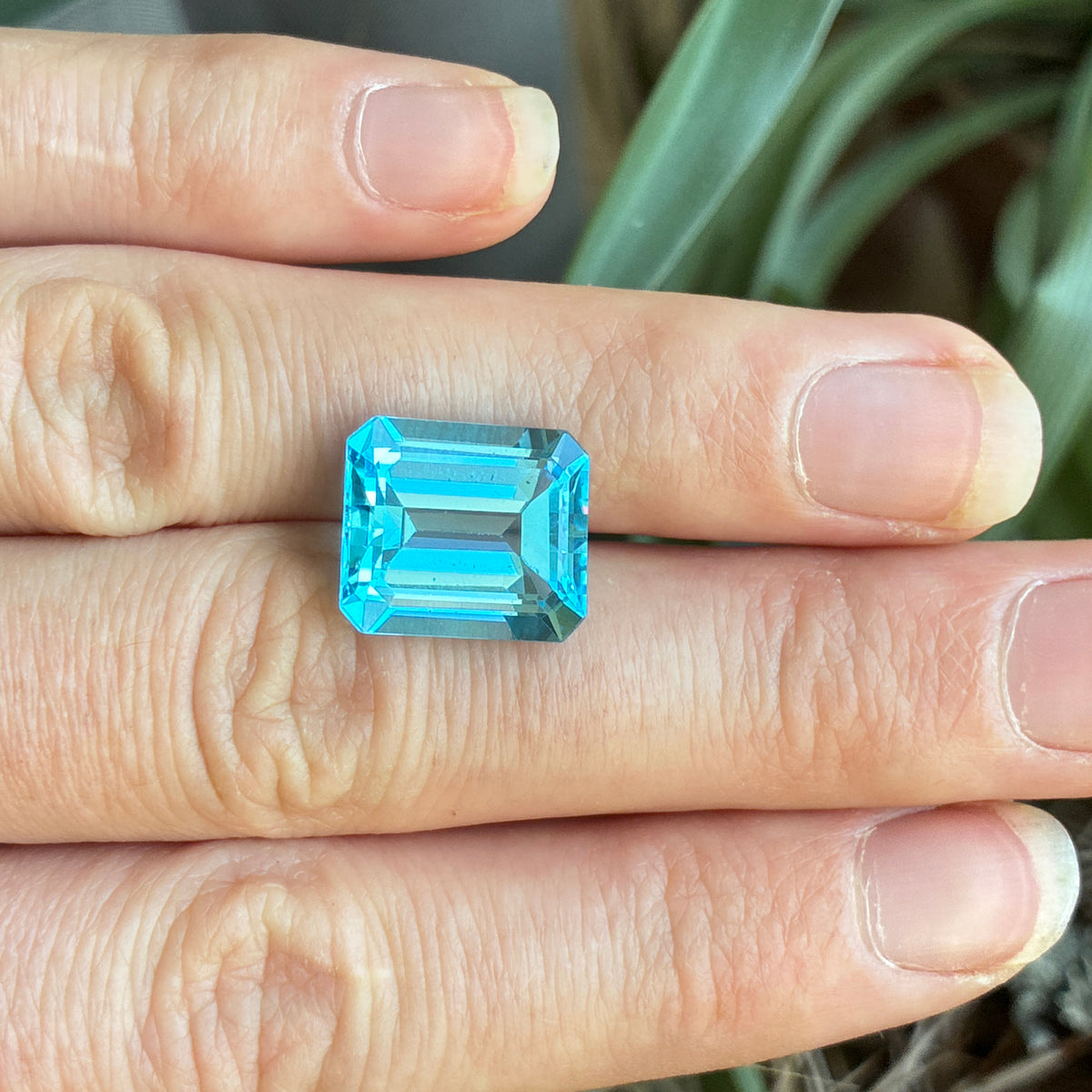 11.38 carat Emerald Cut Loose Blue Topaz