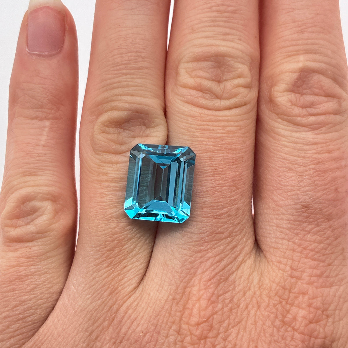 11.38 carat Emerald Cut Loose Blue Topaz