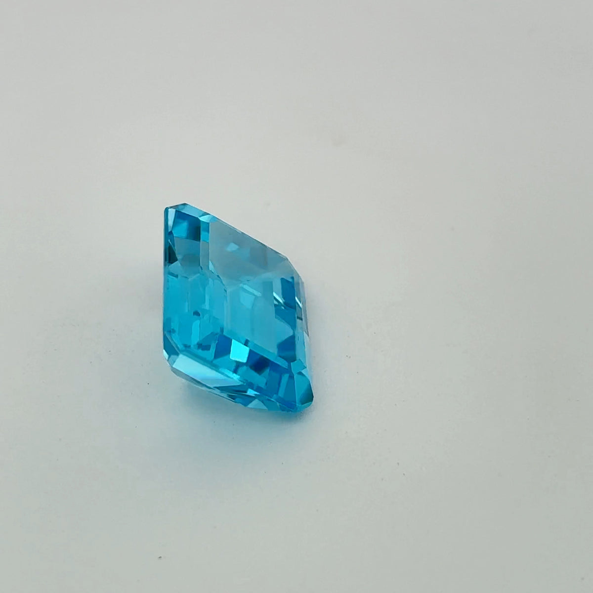 11.38 carat Emerald Cut Loose Blue Topaz