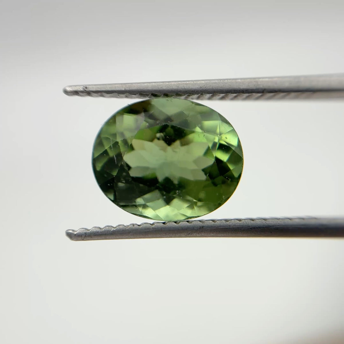10x8mm Oval Cut Green Tourmaline 2.89 carat Gem with wear