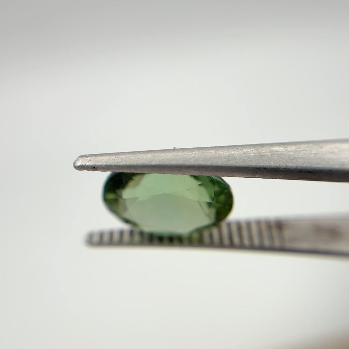 10x8mm Oval Cut Green Tourmaline 2.89 carat Gem with wear