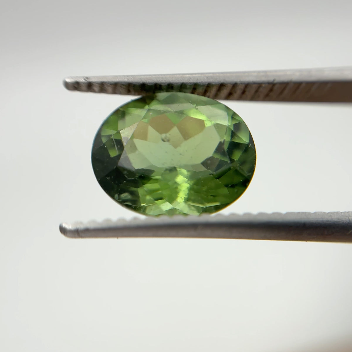 10x8mm Oval Cut Green Tourmaline 2.89 carat Gem with wear
