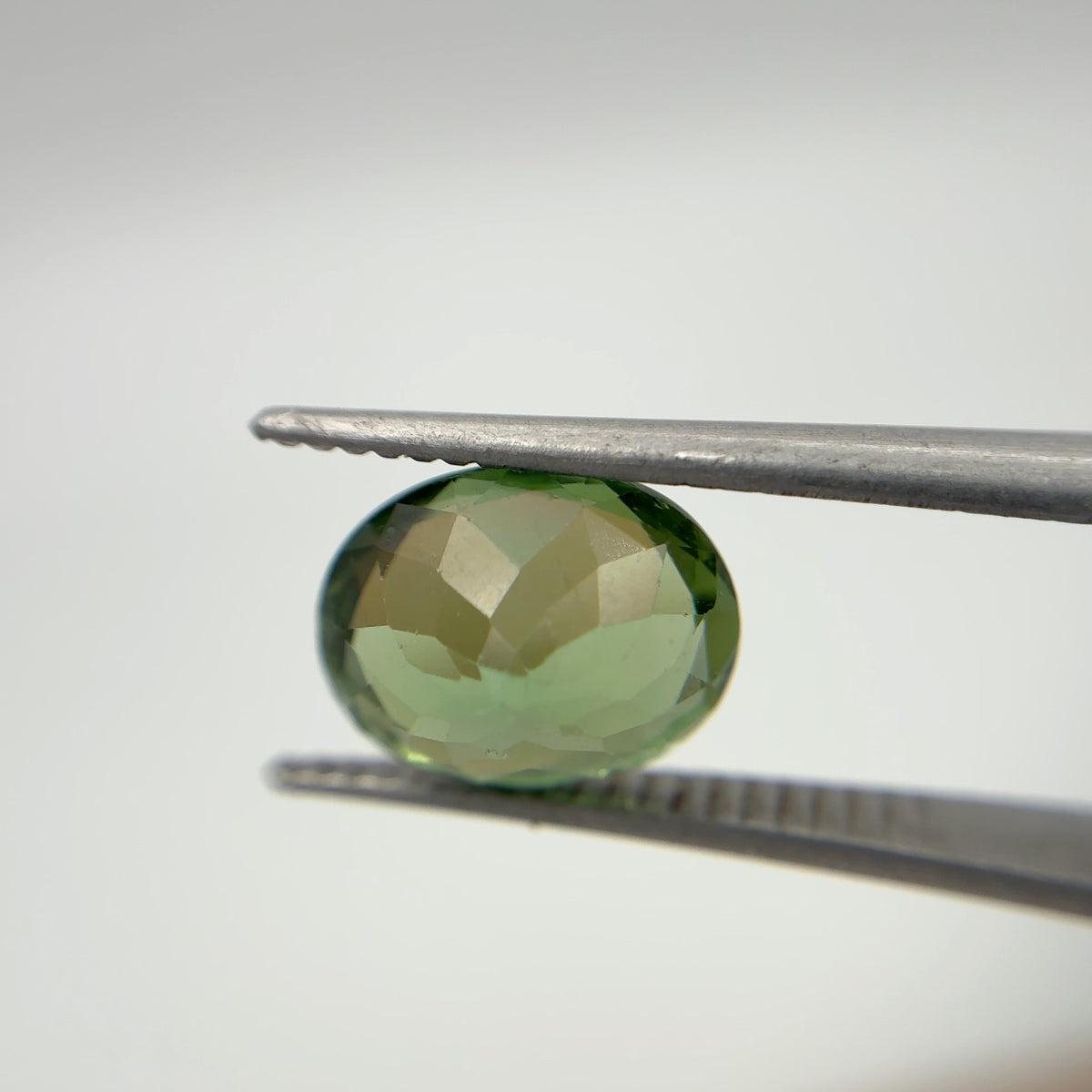 10x8mm Oval Cut Green Tourmaline 2.89 carat Gem with wear
