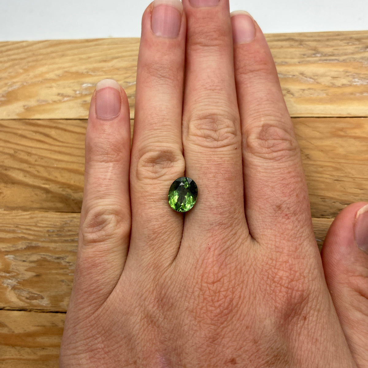 10x8mm Oval Cut Green Tourmaline 2.89 carat Gem with wear