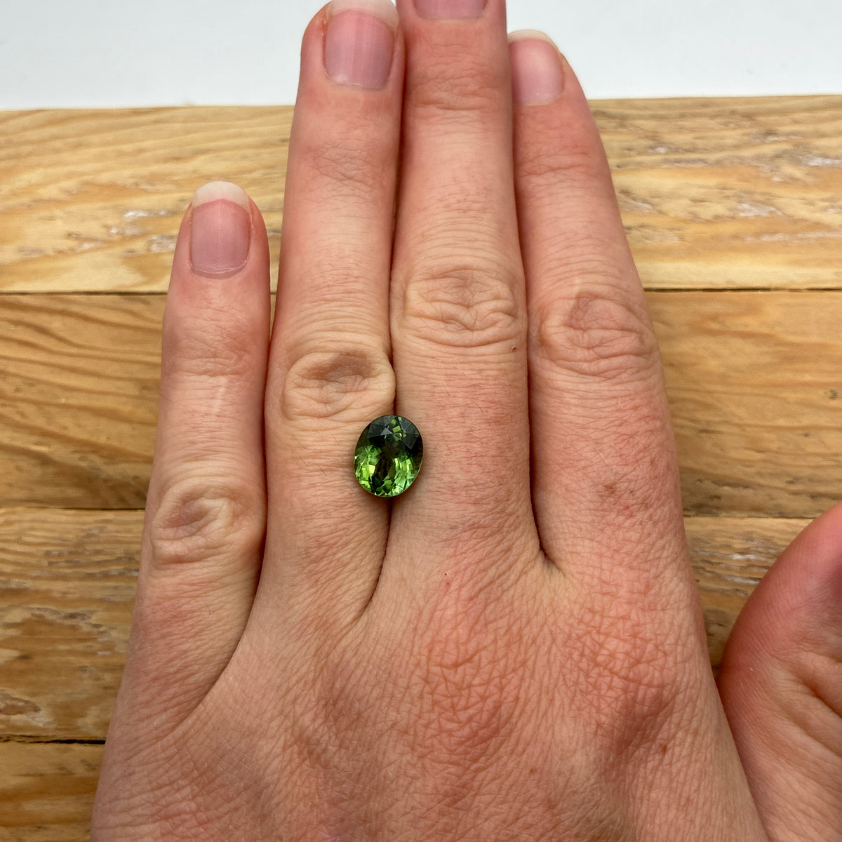 10x8mm Oval Cut Green Tourmaline 2.89 carat Gem with wear