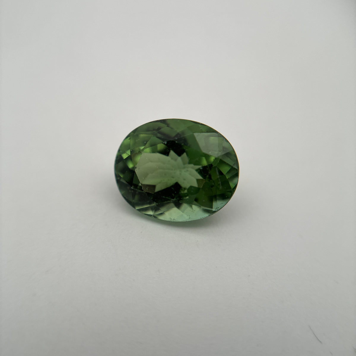 10x8mm Oval Cut Green Tourmaline 2.89 carat Gem with wear