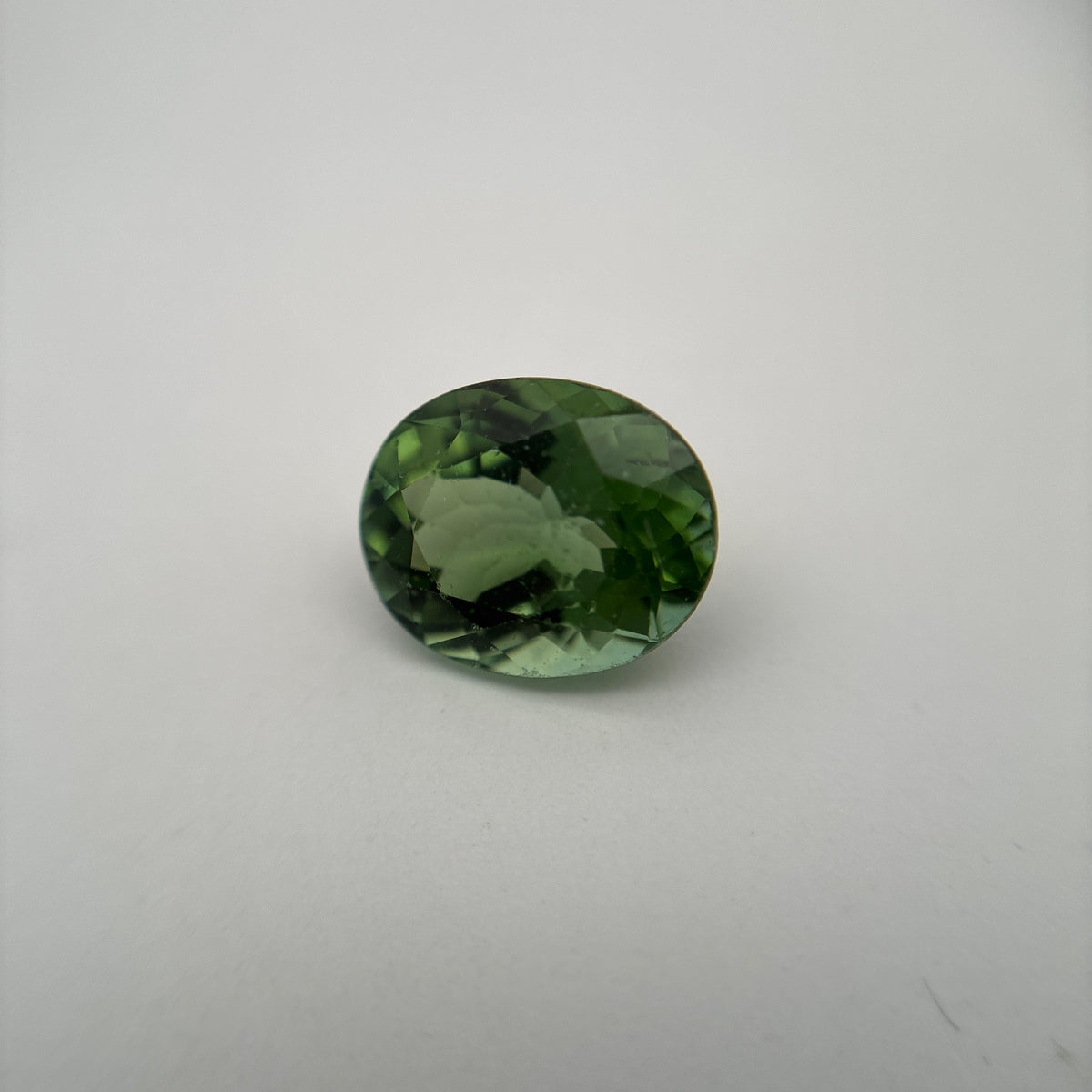 10x8mm Oval Cut Green Tourmaline 2.89 carat Gem with wear