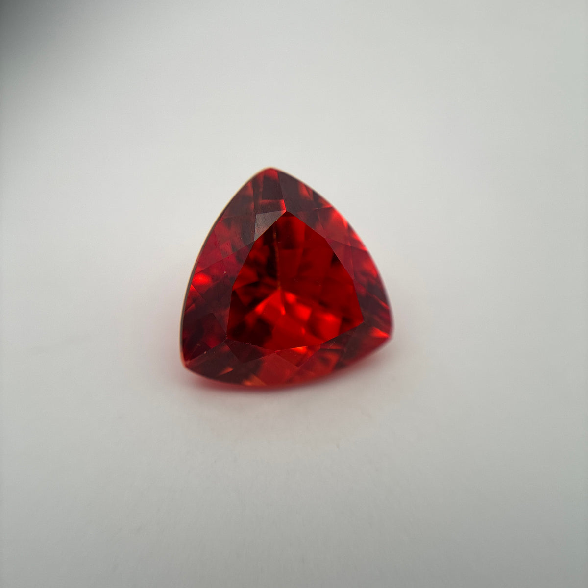 12mm Fiery Orange Lab Sapphire 7 carat, Trillion Cut Loose Gem