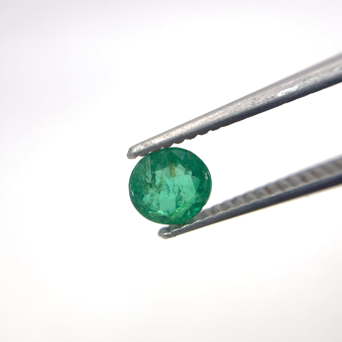 5.4mm Round Cut Green Emerald, 0.63 carat Natural Gem