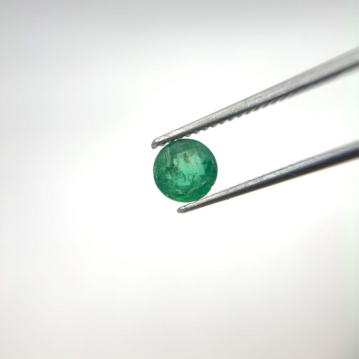 5.4mm Round Cut Green Emerald, 0.63 carat Natural Gem