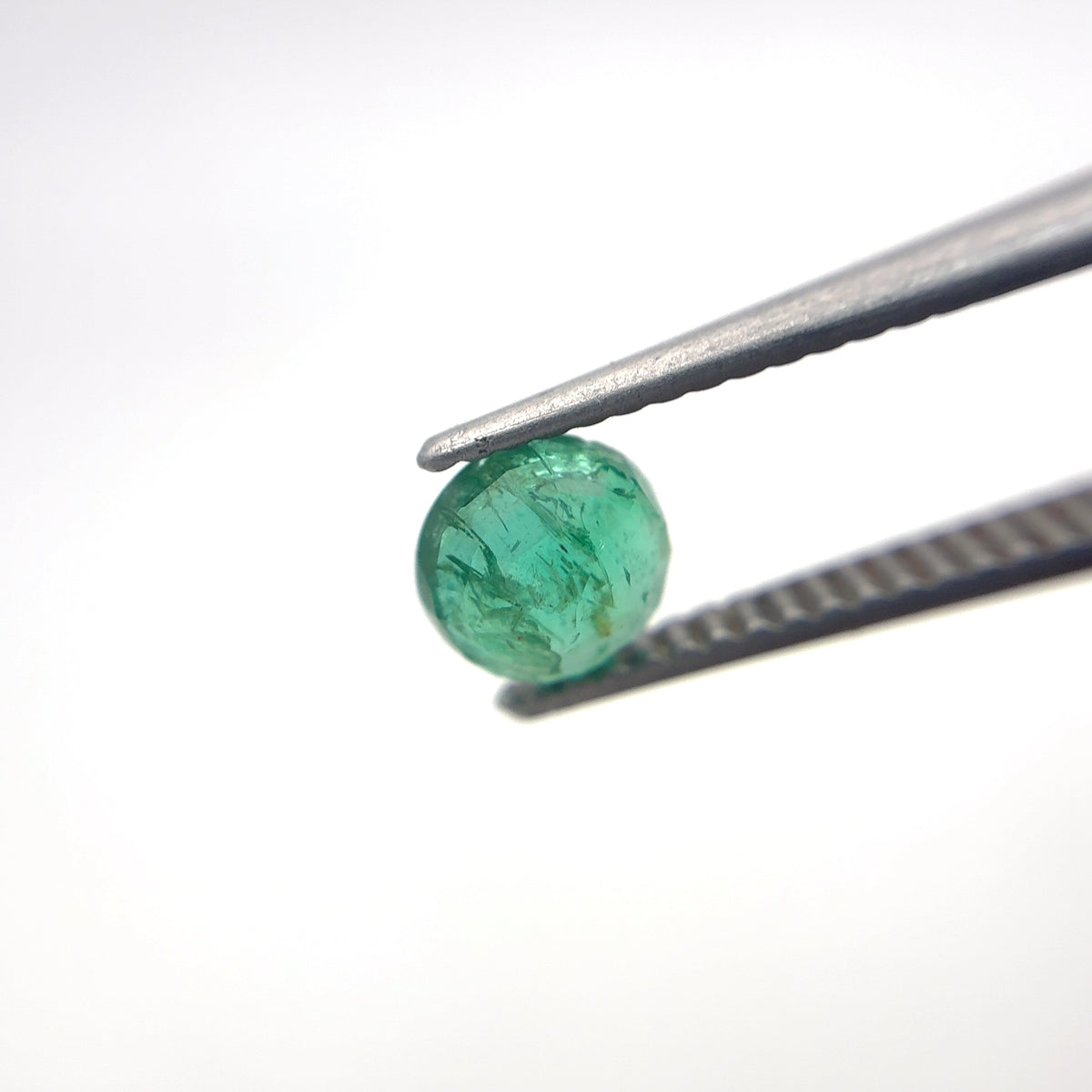 5.4mm Round Cut Green Emerald, 0.63 carat Natural Gem