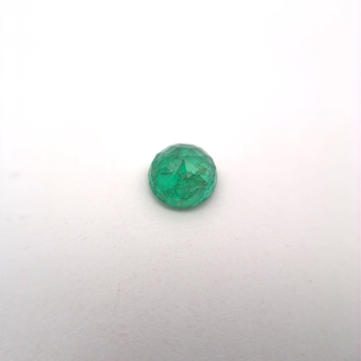 5.4mm Round Cut Green Emerald, 0.63 carat Natural Gem