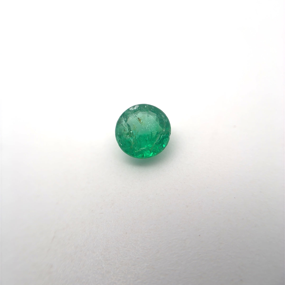 5.4mm Round Cut Green Emerald, 0.63 carat Natural Gem